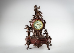 картинка Антикварные мраморные часы с фигурками ангелочков салоне старинных вещей "Шебби" являющийся официальным дистрибьютором в России и Беларуси