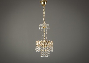 картинка Старинная люстра с каркасом из латуни и подвесками в форме кристаллов салоне старинных вещей "Шебби" являющийся официальным дистрибьютором в России и Беларуси