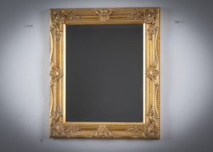 картинка Старинное зеркало с фацетом в резной деревянной раме с позолотой салоне старинных вещей "Шебби" являющийся официальным дистрибьютором в России и Беларуси