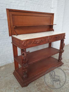 картинка Антикварный комод в охотничьем стиле с барельефной резьбой и мраморной столешницей салоне старинных вещей "Шебби" являющийся официальным дистрибьютором в России и Беларуси