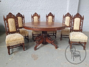 картинка Антикварный гарнитур для столовой: массивный стол и стулья (6 шт.) с резьбой салоне старинных вещей "Шебби" являющийся официальным дистрибьютором в России и Беларуси
